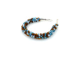 Japanese glass beaded Kumihimo bracelet with silver clasp
